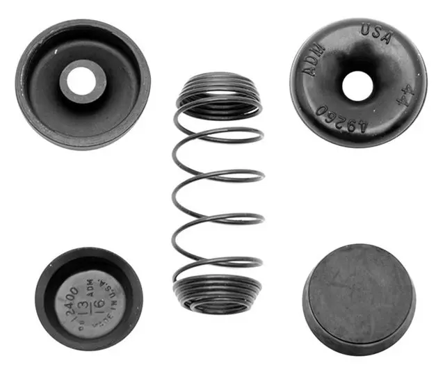 18031358 - : Rear Drum Brake Wheel Cylinder Repair Kit with Spring, Boots, and Caps for GM Image