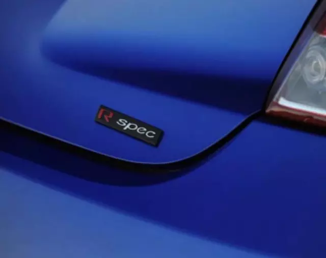 2V020ADU05 - Exterior: Badge R - Spec for Hyundai: Veloster, Veloster N Image