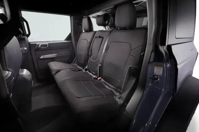 VR2DZ1863812A - Interior: Seat Covers, With Armrest And Cup Holder for Ford: Bronco Image