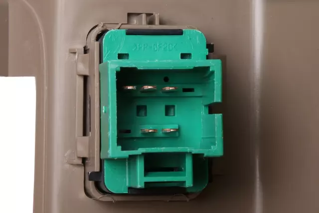 Medium Neutral Front Passenger Side Door Accessory Switch Mount Plate - GM (23395357)