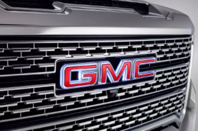 84741557 - Exterior: Front Illuminated Gmc Emblem - Red for GM Image