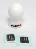 C28651EA04US - : Nismo Nylon Shift Knob for Nissan: 200SX, 240SX, 280ZX, 300ZX, 310, 350Z, 720, Altima, Armada, Axxess, Cube, Frontier, GT-R, Juke, Kicks, Maxima, Murano, NV1500, NV200, NV2500, NV3500, Pathfinder, Pathfinder Armada, Pulsar NX, Quest, Rogue, Rogue Select, Sentra, Stanza, TITAN, TITAN XD, Van, Versa, Versa Note, Xterra Image