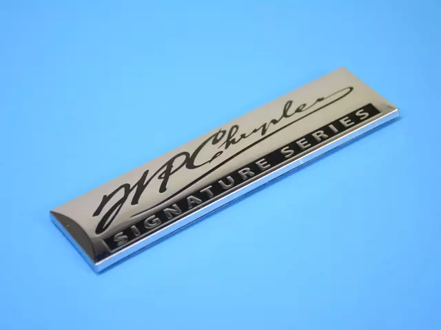 5152415AA - : Nameplate for Chrysler: 300, Aspen, Pacifica, PT Cruiser, Sebring, Town &amp; Country | Dodge: Caravan, Grand Caravan Image