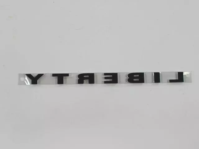 68080456AA - Exterior Ornamentation: Front Door Nameplate for Mopar Image
