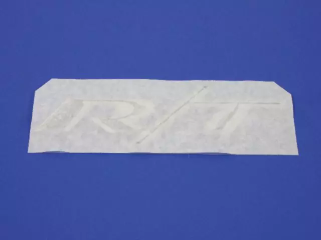 4805957AA - Exterior Ornamentation: R/t Nameplate for Mopar Image