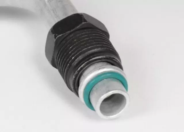 12472277 - : Engine Oil Cooler Inlet Hose Kit with Protector for Chevrolet: C1500, C2500, C3500, K1500 Pickup, K2500 Pickup, K3500 Pickup, Suburban K1500, Suburban K2500 | GMC: C1500 Pickup, C2500 Pickup, C3500 Pickup, K1500 Pickup, K2500 Pickup, K3500 Pickup, Suburban K1500, Suburban K2500 Image