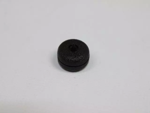 5093280AC - Interior Trim: Belt Webbing Button for Chrysler: 300, Crossfire, Pacifica, PT Cruiser, Sebring | Dodge: Challenger, Charger, Dakota, Durango, Magnum, Neon, Ram 1500, Ram 2500, Ram 3500, Stratus, Viper | Jeep: Grand Cherokee Image