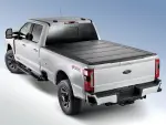 VPC3Z99501A42A - Exterior: Hard Folding 4 Panel Tonneau/Bed Cover 6.75ft for Ford: E-350 Super Duty, E-450 Super Duty, F-250 Super Duty, F-350 Super Duty, F-450 Super Duty, F-550 Super Duty Image