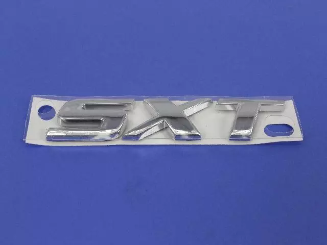 5182346AA - Exterior Ornamentation: Decklid Nameplate for Mopar Image image