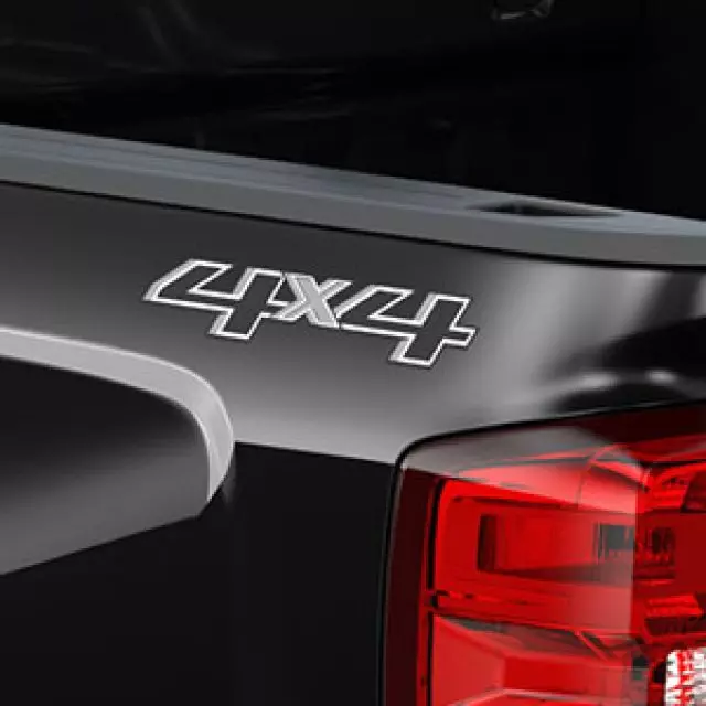 23490448 - : 4X4 Logo Silver and Charcoal for Chevrolet: Silverado 1500, Silverado 2500 HD, Silverado 3500 HD | GMC: Sierra 1500, Sierra 2500 HD, Sierra 3500 HD Image