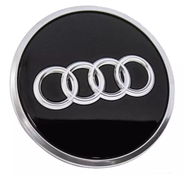 8W0601170A - : Center Cap for Audi: A4, A4 allroad, A4 Quattro, A5 Quattro, A5 Sportback, A6 allroad, A6 Quattro, A7 Sportback, A8 Quattro, e-tron Quattro, e-tron Sportback, Q5, Q5 PHEV, Q5 Sportback, Q7, Q8, RS Q8, RS5, RS5 Sportback, RS6 Avant, S4, S5, S5 Sportback, S6, S7 Sportback, S8, SQ5, SQ5 Sportback, SQ7, SQ8 Image