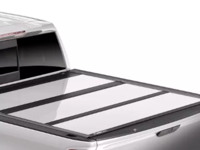19431686 - : Standard Bed Tri-Fold Hard Tonneau Cover with Battery Operated LED Light in White Frost by UnderCover(TM) - Associated Accessories for Chevrolet: Silverado 2500 HD, Silverado 3500 HD | GMC: Sierra 2500 HD, Sierra 3500 HD Image