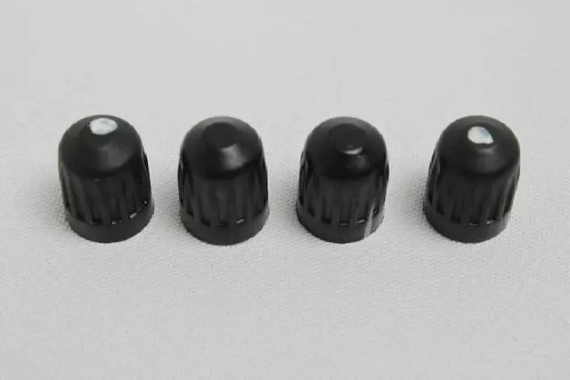 68184875AA - : Tire Pressure Monitoring System Valve Stem Cap for Chrysler: 200, Pacifica, Voyager | Dodge: Dart, Durango | Jeep: Compass, Grand Cherokee, Renegade Image