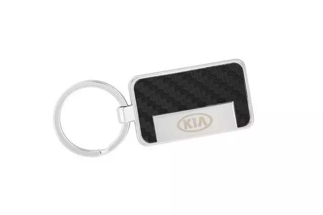 UM016AY743 - Merchandise: Key Chain - Black Carbon Fiber Kia Style 1 for Kia: Amanti, Borrego, Cadenza, Carnival, Forte, Forte Koup, Forte5, K5, K900, Niro, Niro EV, Optima, Rio, Rio5, Rondo, Sedona, Seltos, Sorento, Soul, Soul EV, Spectra, Spectra5, Sportage, Stinger, Telluride Image
