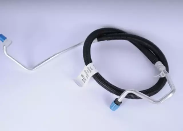 12472290 - : Engine Oil Cooler Inlet Hose Kit with Protector for Chevrolet: Blazer, C1500, C2500, C3500, K1500 Pickup, K2500 Pickup, K3500 Pickup | GMC: C1500 Pickup, C2500 Pickup, C3500 Pickup, K1500 Pickup, K2500 Pickup, K3500 Pickup, Yukon Image