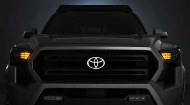 PT41335250 - Exterior: Illuminated Front Emblem - Bar Type - Chrome for Toyota: Tacoma Image
