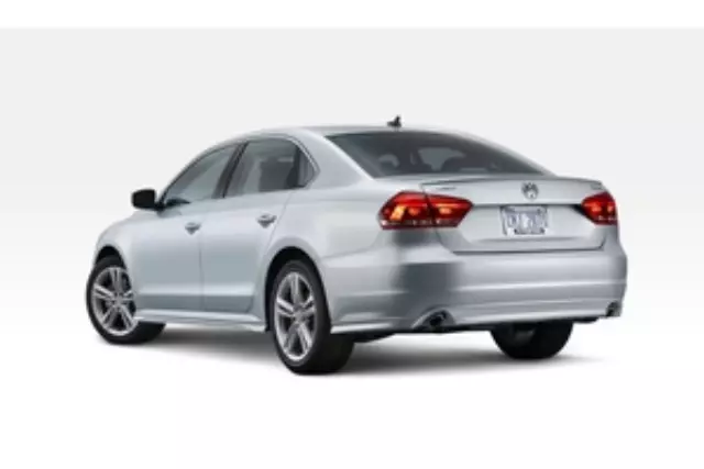 561071610AA7W - Exterior: Rear Valence, Dual Exit Exhaust (Painted) for Volkswagen: Passat Image