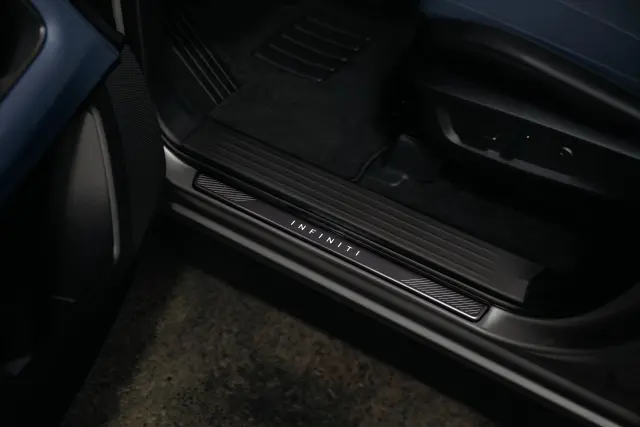 T99G66SAB1 - Exterior: INFINITI Radiant Illuminated Kick Plates - Dark (4 door) for Infiniti Image