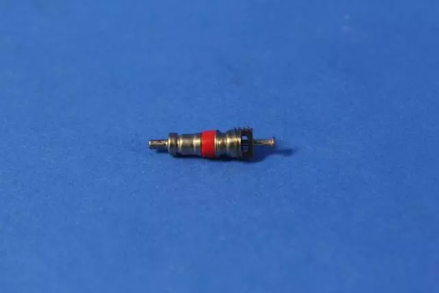 4897346AA - Wheels, Covers and Jacks: Wheel Sensor Valve Valve Core for Mopar Image image