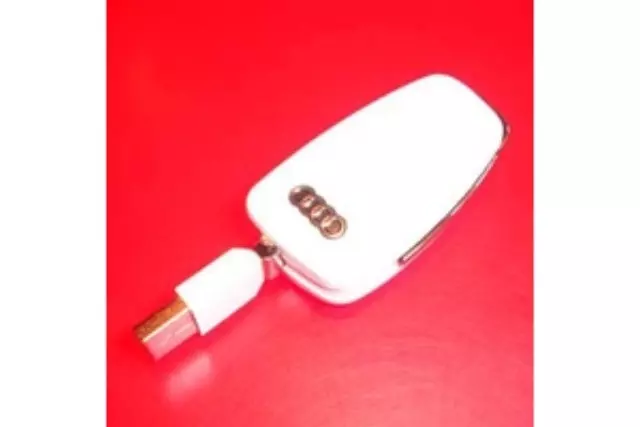 8R0063827D - Audio/Video: Audi USB Memory Key - White for Audi: A3, A3 Quattro, A4 Quattro, A5 Quattro, A6 Quattro, A7 Quattro, A8 Quattro, allroad, Q5, Q7, R8, RS5, RS7, S4, S5, SQ5, TT Quattro, TTS Quattro Image