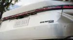 PT90B3326302 - : 2026 GENUINE NEW GLOSS BLACK OUT LEXUS ES 500E AWD EMBLEM OVERLAY PT90B-33263-02 for Lexus Image