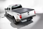 V9C3Z99501A42EA - Body: Tonneau Cover - Hard Folding by REV - 6.5 Bed for Ford: F-250 Super Duty, F-350 Super Duty, F-450 Super Duty Image