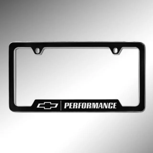 19330393 - Exterior: License Plate Frame, Performance, Black for Cadillac: Escalade, Escalade ESV | Chevrolet: Blazer, Blazer EV, Camaro, Colorado, Corvette, Cruze, Cruze Limited, Equinox, Equinox EV, Express 1500, Express 2500, Express 3500, Express 4500, Impala, Malibu, Silverado 1500, Silverado 1500 LD, Silverado 1500 LTD, Silverado 2500 HD, Silverado 3500 HD, Silverado EV, Sonic, Spark, Spark EV, SS, Suburban, Suburban 1500, Suburban 3500 HD, Tahoe, Trailblazer, Traverse, Trax, Volt | GMC: Savana 3500 Image