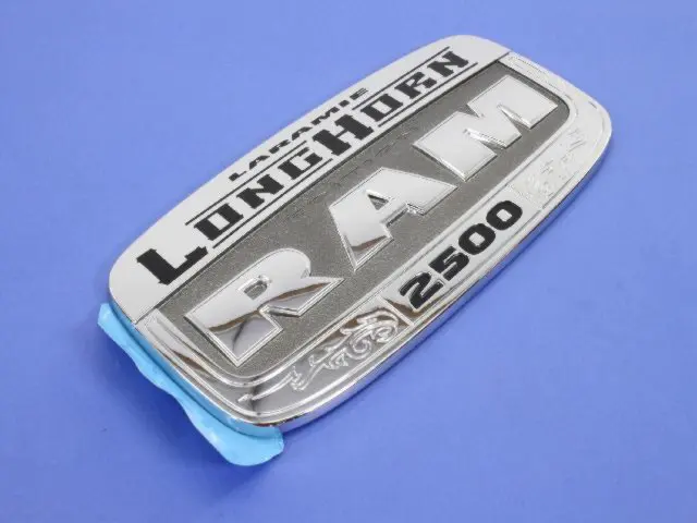 Front Door Nameplate, Left - Mopar (68085777AA)