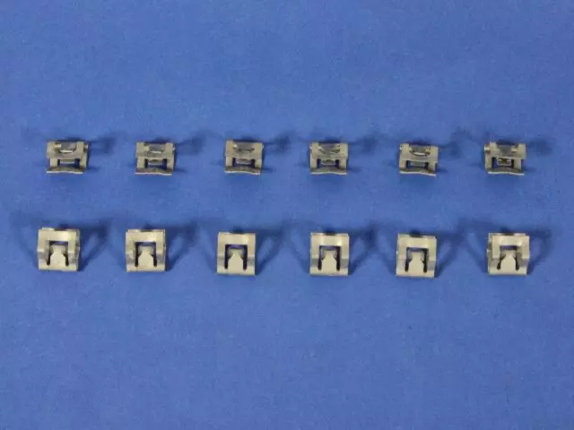 6505660AA - Electrical: Bezel Clip for Chrysler: Pacifica, Town &amp; Country, Voyager | Dodge: Caravan, Grand Caravan Image