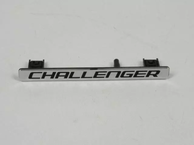 68054676AA - Interior Trim: Instrument Panel Nameplate for Mopar Image