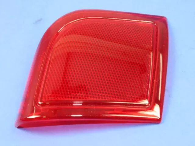 Door Trim Panel Reflector, Left - Mopar (4698957AA)