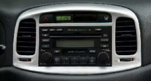 87701E110XM - Interior: Center Fascia - 3 And 4 Door - Dark Metal for Hyundai: Accent, Genesis Coupe, Sonata Image