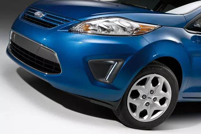 BE8Z17E811AA - Electrical: Lamp Bezels - Auxiliary - Black for Ford: Fiesta Image