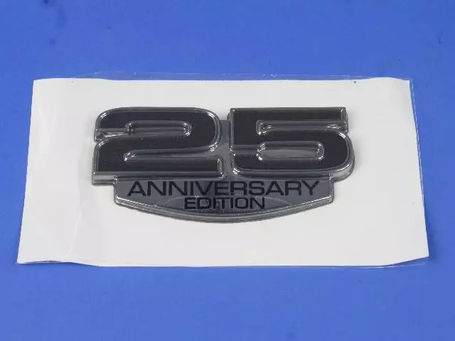 5182139AA - Exterior Ornamentation: Anniversary Edition Nameplate for Mopar Image image