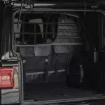 68625070AA - : Storage Wall/Pet Barrier, sold by XG Cargo for Jeep: Wrangler, Wrangler JK Image