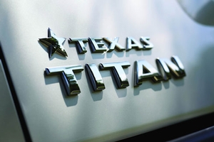 999D1WR000 - Exterior: Texas Titan Rear Tail Gate Badge for Nissan: Altima, NV3500, TITAN Image