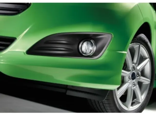 EE8Z17E811AA - Exterior: Lamp Bezels - Auxiliary - Black for Ford: Fiesta Image