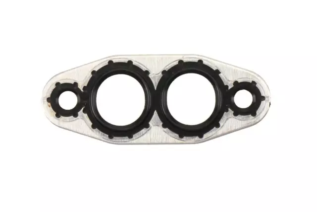 15203889 - : Engine Oil Cooler Gasket for Cadillac: CTS, Escalade, Escalade ESV, Escalade EXT | Chevrolet: Avalanche, Avalanche 1500, Camaro, Caprice, Corvette, Express 1500, Express 2500, Express 3500, Express 4500, LCF 3500, Silverado 1500, Silverado 1500 Classic, Silverado 1500 HD, Silverado 1500 HD Classic, Silverado 2500, Silverado 2500 HD, Silverado 2500 HD Classic, Silverado 3500, Silverado 3500 Classic, Silverado 3500 HD, SS, Suburban 1500, Suburban 2500, Suburban 3500 HD, Tahoe | GMC: Savana 1500, Savana 2500, Savana 3500, Savana 4500, Sierra 1500, Sierra 1500 Classic, Sierra 1500 HD, Sierra 1500 HD Classic, Sierra 2500, Sierra 2500 HD, Sierra 2500 HD Classic, Sierra 3500, Sierra 3500 Classic, Sierra 3500 HD, Yukon, Yukon XL 1500, Yukon XL 2500 | Hummer: H2 | Pontiac: G8 Image