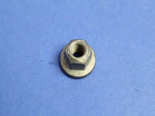 6505316AA - : Hex Flange Lock Nut, Mounting Right Side for Chrysler: 300, 300M, Aspen, Concorde, Pacifica, PT Cruiser, Sebring, Town &amp; Country, Voyager | Dodge: Avenger, Caravan, Challenger, Charger, Dakota, Durango, Grand Caravan, Intrepid, Journey, Magnum, Neon, Nitro, Ram 1500, Ram 2500, Ram 3500, Stratus, Viper | Fiat: 500 | Jeep: Cherokee, Commander, Compass, Grand Cherokee, Grand Cherokee L, Grand Wagoneer, Liberty, Wagoneer, Wrangler | Ram: 1500, 1500 Classic, 2500, 3500, Dakota, ProMaster 1500, ProMaster 2500, ProMaster 3500 | SRT: Viper Image