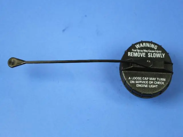 4682674AB - Fuel System: Cap Assembly for Chrysler: 300M, Cirrus, Concorde, LHS, Sebring, Town &amp; Country | Dodge: Caravan, Grand Caravan, Intrepid, Neon, Stratus Image