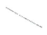 68549289AA - Exterior Ornamentation: Grand Cherokee Nameplate, Left for Jeep: Grand Cherokee, Grand Cherokee L Image