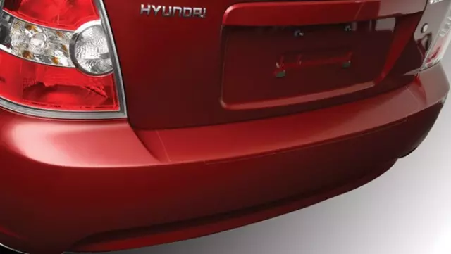 1R031ADU00 - Exterior: 2012-2017 Hyundai Accent - Rear Bumper Applique - 4 Door Model for Hyundai: Accent, Genesis Coupe, Sonata Image