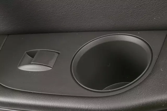 Ebony Rear Passenger Side Door Trim - GM (23273312)