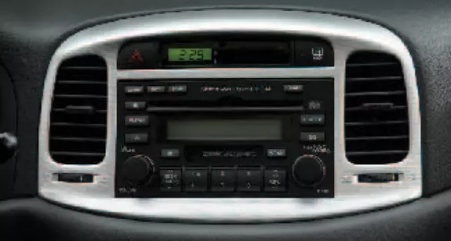 87701E110 - Interior: 2007-2011 Hyundai Accent - Center Fascia - 3 And 4 Door - Bright Silver for Hyundai: Accent, Genesis Coupe, Sonata Image