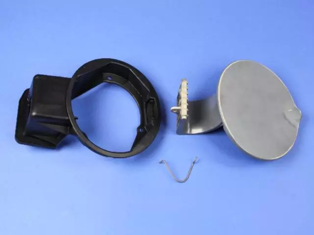 4797712 - Body: Fuel Door for Chrysler: Grand Voyager, Town &amp; Country, Voyager | Dodge: Caravan, Grand Caravan Image