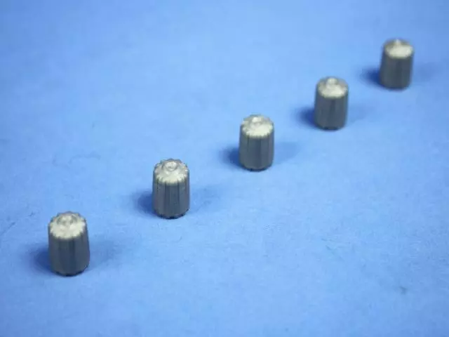 68024258AA - Wheels: Valve Stem Cap Kit for Chrysler: 200, 300, Pacifica, PT Cruiser, Sebring, Town &amp; Country | Dodge: Avenger, Caliber, Caravan, Charger, Grand Caravan, Journey, Magnum | Jeep: Commander, Compass, Grand Cherokee, Liberty, Patriot Image