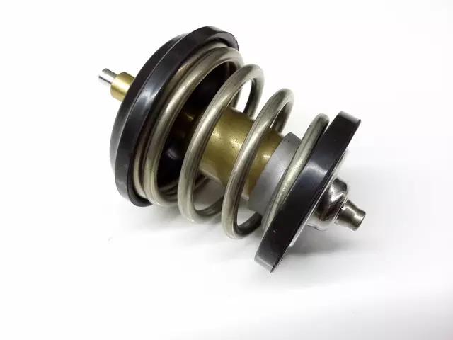 6H121113B - Cooling System: Thermostat for Volkswagen: Beetle, CC, Eos, GTI, Jetta, Passat, Rabbit, Tiguan, Tiguan Limited Image