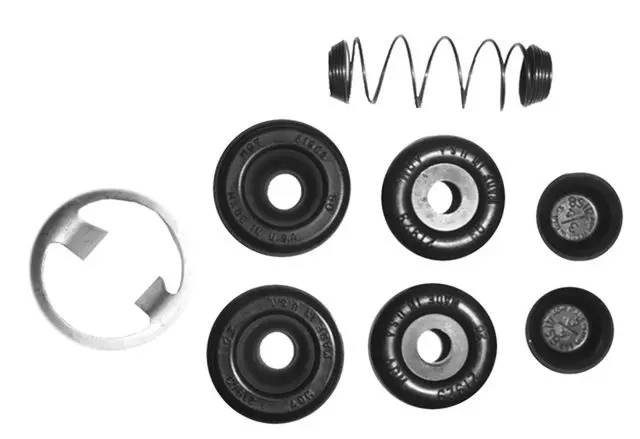 18031239 - : Rear Drum Brake Wheel Cylinder Repair Kit with Spring, Boots, Retainer, and Caps for GM Image