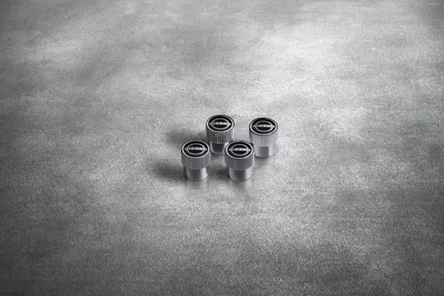 T99W36TA0A - Other: Valve Stem Caps, Nissan Logo, 4 Pc for Nissan: Frontier, Pathfinder, Z Image