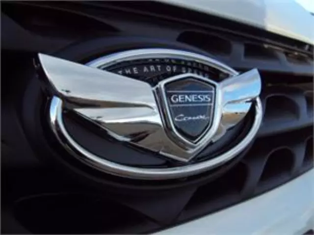 AMP00G0352 - Exterior: Wing Emblem Kit - 4 Wheel Cap Covers for Hyundai: Genesis Coupe Image